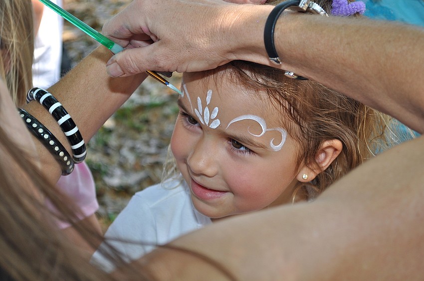 Lily Rose Greene got her face painted at the carnival.