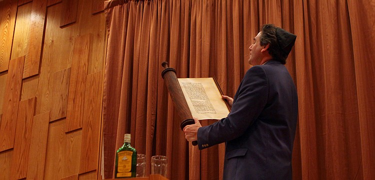 Rabbi Katz reads from Megillat Esther, the Book of Esther, on Saturday, March 19 at Temple Beth Israel.
