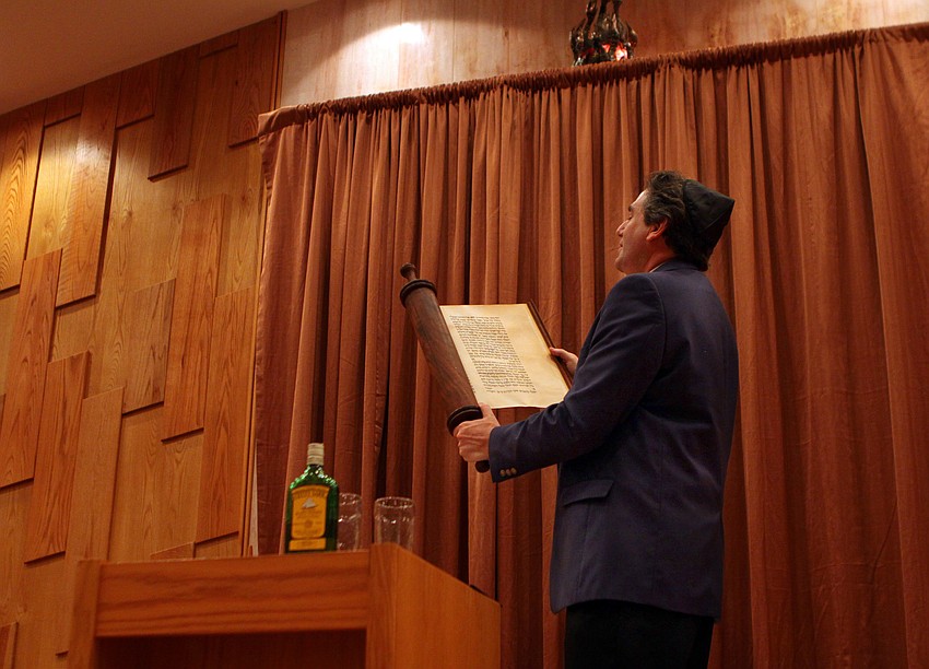 Rabbi Katz reads from Megillat Esther, the Book of Esther, on Saturday, March 19 at Temple Beth Israel.