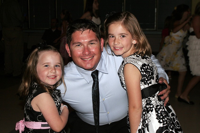 Michael Turner brought his two daughters Sophie, 4, and Mady, 7, to the dance.