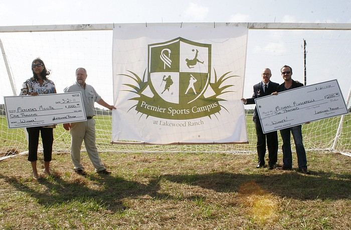 The logo features crest design. From left: name winner Mercedes Movilla; SMR CEO Rex Jensen, Director of Sports Tim Mulqueen and logo winner Michael Muscarella