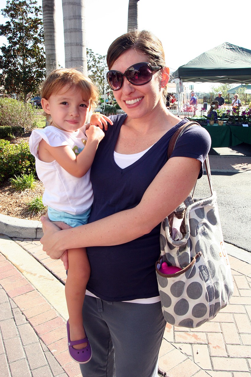 Rebecca Gurski enjoyed the warm weather with her daughter Reese, 2.