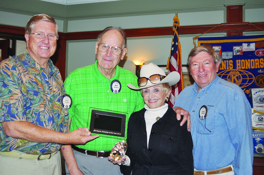 From left, Kiwanis Club of Longboat Key President Bob Gault, Bill Sceva, Edith Barr Dunn and John Wild.