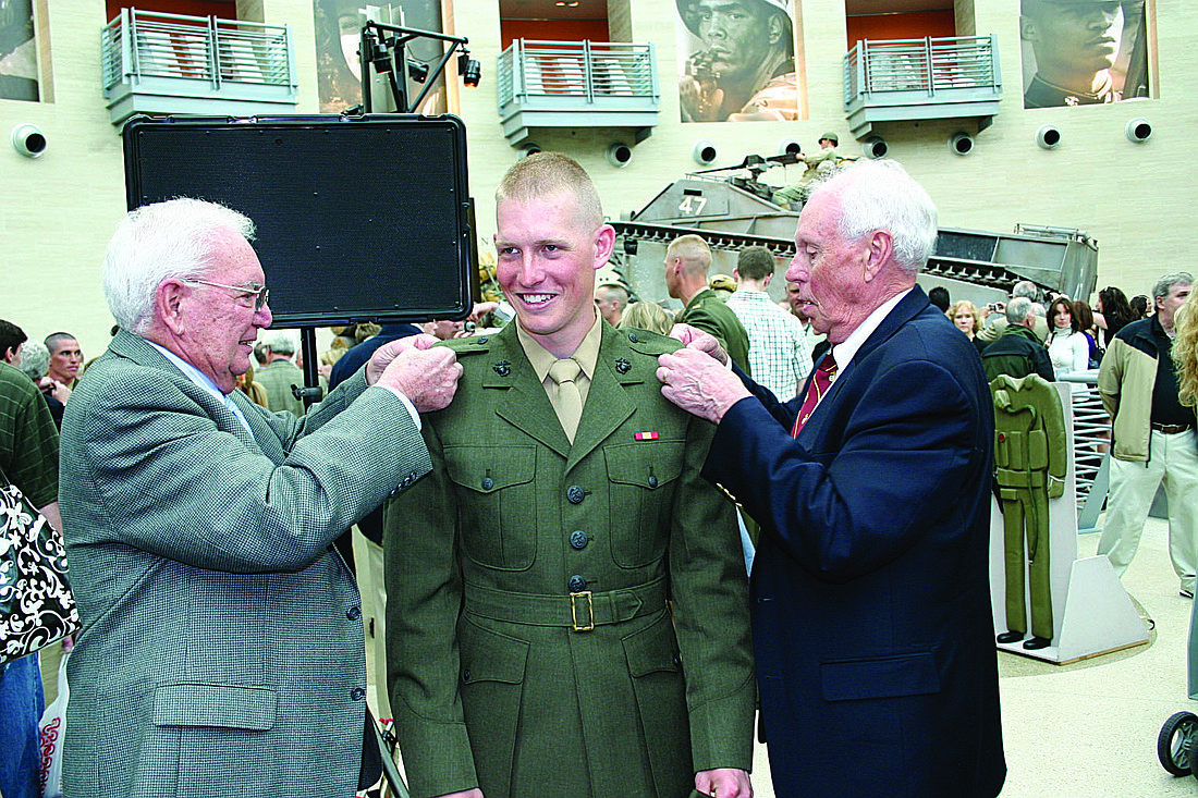 From left, George Walsh, a World War II Marine veteran; Brian Walsh; and David Beliles, a Korean War Marine veteran and Plymouth Harbor resident.