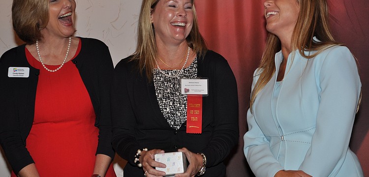 Cindy Kaiser, executive director of the Education Foundation of Sarasota County, Teacher of the Year Melissa Owens and Patty Brustad, program coordinator