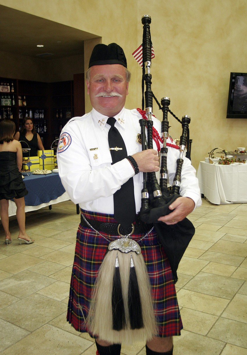 Kevin O'Neill of the Clearwater Fire Department Honor Guard entertained guests throughout the evening.