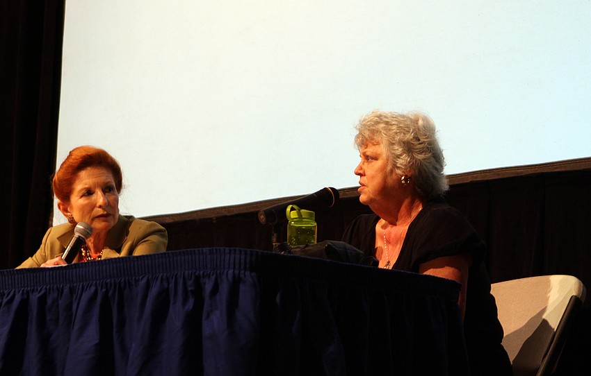 Roz Goldberg, left, listens to Susi Konicov talk about her experience as a hidden child survivor of the Holocaust during a Q&A session that followed the movie 