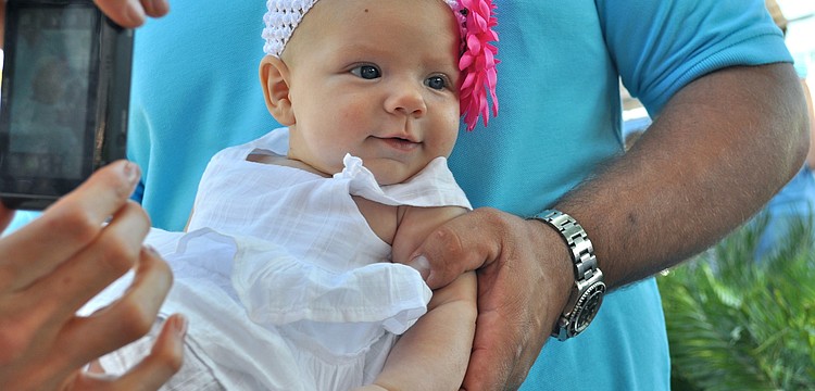 London Polubinski is happy to be out and about.