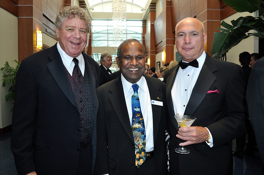 Ron Greenberg, Kumar Mahadevan, president and CEO of Mote Marine and Vincent Dipano