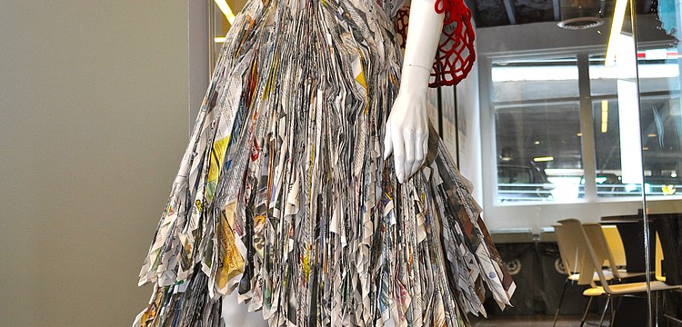 The mannequin sporting the dress sure could use a pair of red stilettos â€”Â size seven-and-a-half.