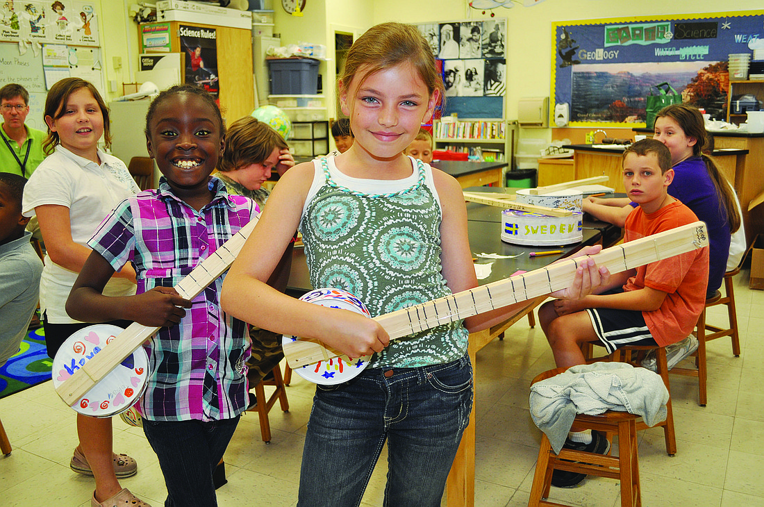 Mikeya Jackson and Alexcia Cavanaugh are learning to play songs for the schoolÃ¢â‚¬â„¢s cultural fair.