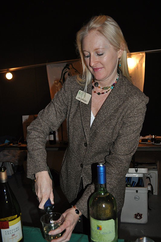 Lisa Bradley of CPA Associates poured wine for guests.