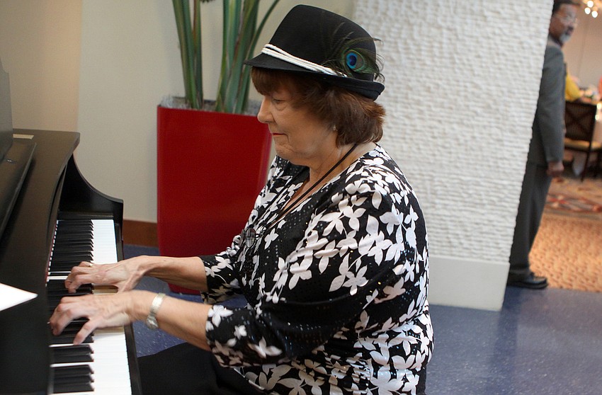 Barbara Adams played the piano in the lobby on Thursday, March 31 during the monthly dinner meeting of the Sarasota Republican Club at the Sarasota Yacht Club.