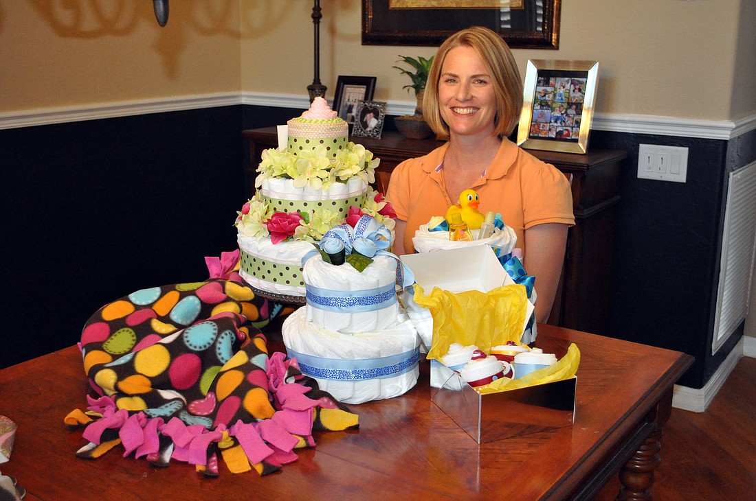 River Club resident Misty Pope sells custom made diaper cakes through her business Ladybug Bakeries.