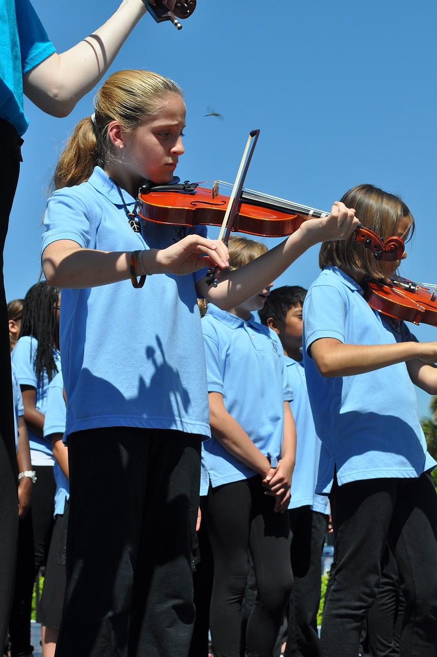 The students at Bay Haven School pulled double duty as singers and musicians.