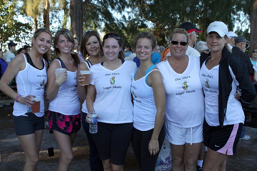Kendra Wood, Becky West, Christina Laethem, Rebecca Fiore, Jill Sieber, Carol Bonella and Mary Beth MacNutt made up the Cha-Cha Lager Heads team on Saturday, April 2 for the 25th Annual Run for the Turtles on Siesta Key Beach.