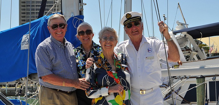 John and Michele Powell and Monique and Gerry Breyton aboard their boat, "Caladon"