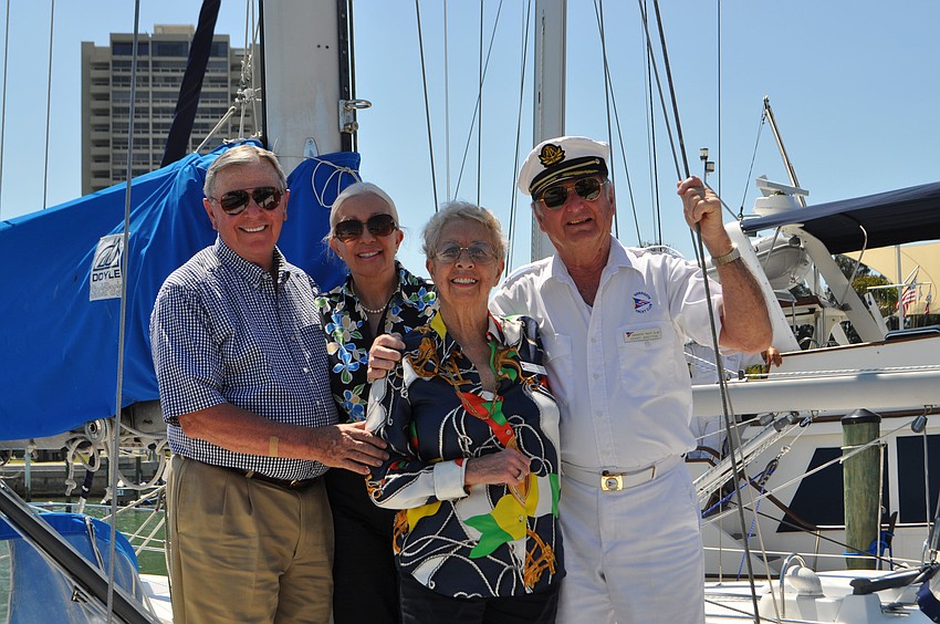 John and Michele Powell and Monique and Gerry Breyton aboard their boat, 