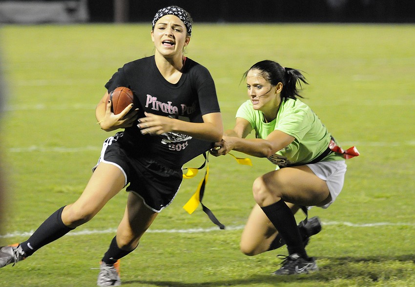 Senior Jada Schopfer, right, keeps sophomore Brittany Rangel from reaching the end zone.