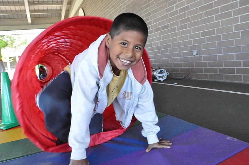 Rodolfo Estraea, 8, went as fast as he could through the tunnel.