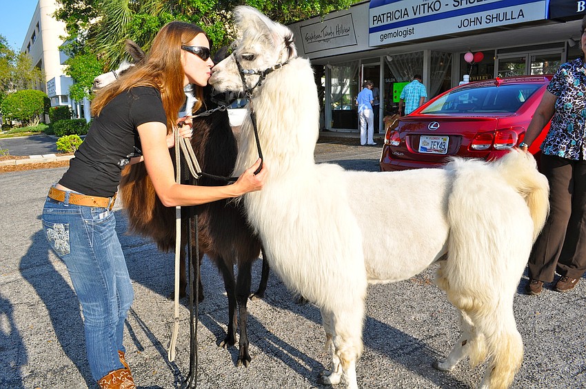 Karli Wilbanks gives Paintball Pete a kiss.