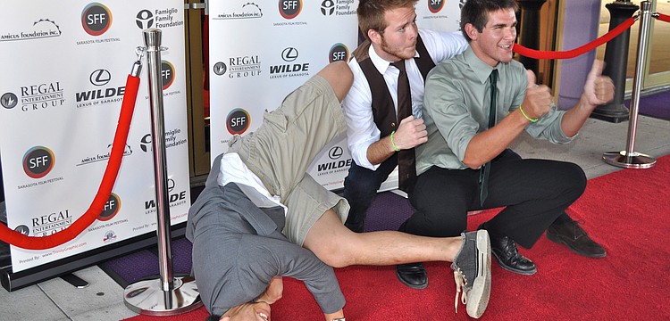 Alek Senenoi, Justin Dodd and Matt Arbucci strike a pose on the red carpet.
