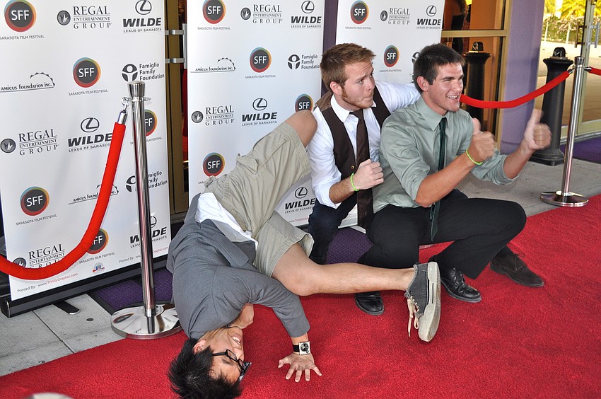 Alek Senenoi, Justin Dodd and Matt Arbucci strike a pose on the red carpet.