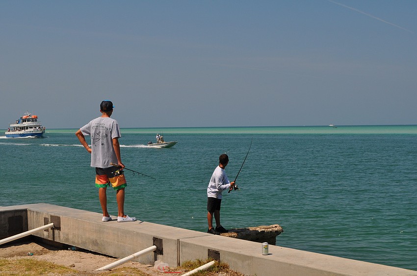 Sarasota Military Academy students Nick Hallorn and A.J. Robman spent the day fishing on Siesta Key.