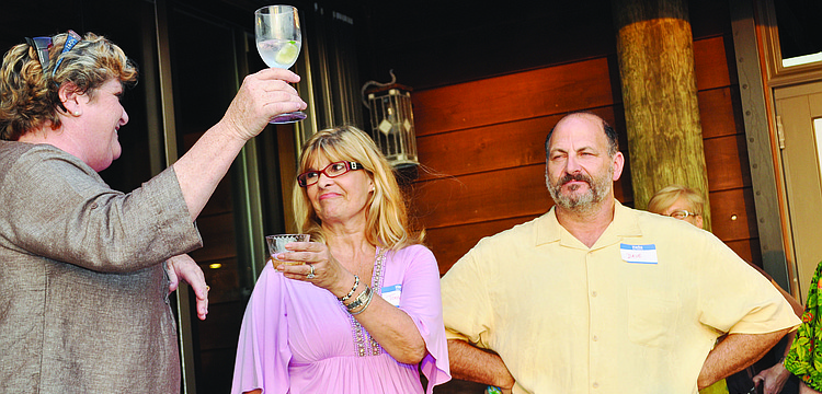 Maureen Horn toasts with Teena and David Kantor