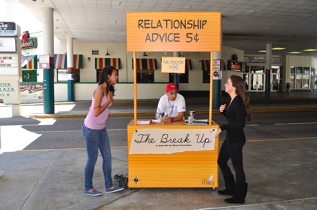 Monica Cubillos and Chantal Varon received some stellar "relationship advice" from Shaun Greenspan's booth, which he used to promote his film.