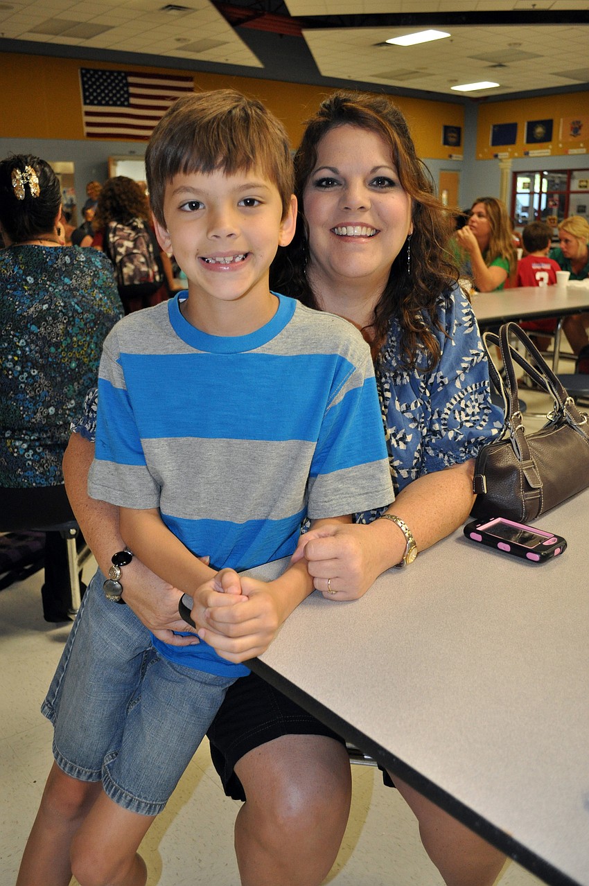 Third-grader Cooper Milewski, pictured with his mom Pam, is in his first year at Freedom after moving to Florida from Texas.