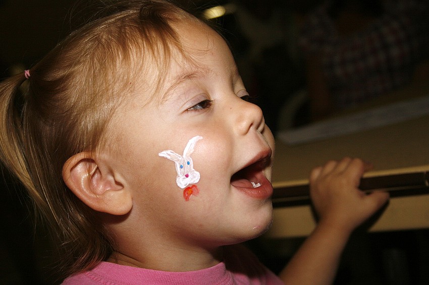 Julianne Holmes, 2, loved her Easter Bunny face painting.