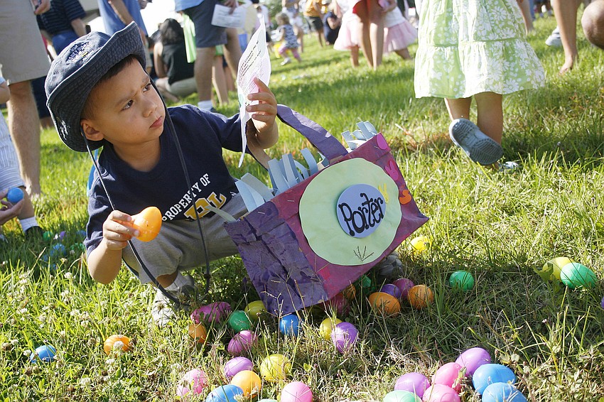 Porter Strand, 4, selected his eggs carefully according to the hunt instructions.