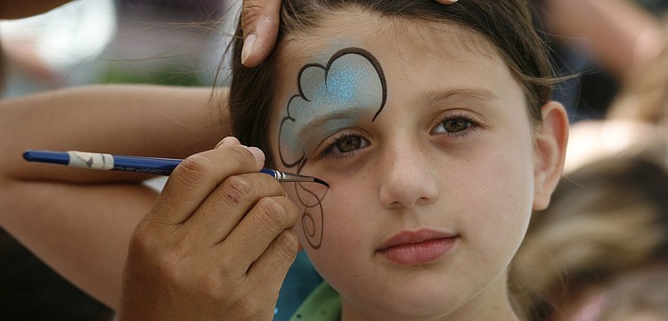 Abby Burch, 7, got her face painted before the Easter egg hunts began.