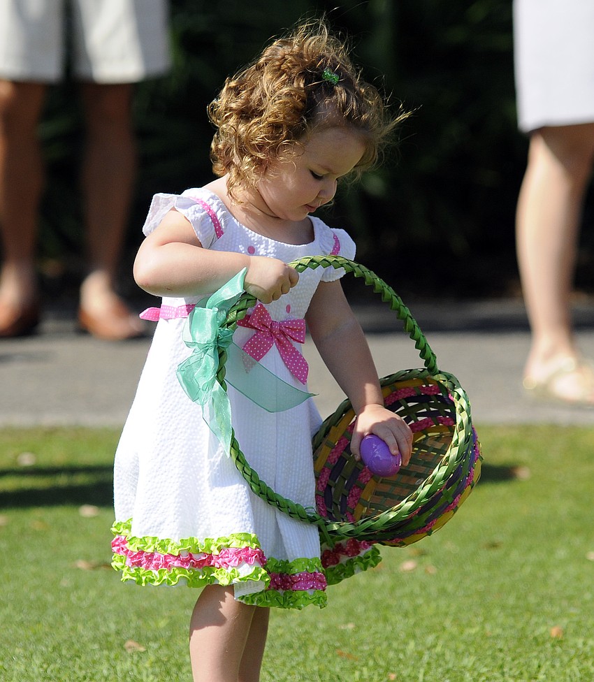 Two-year-old Savanna Snider was one of the first children to find an egg.
