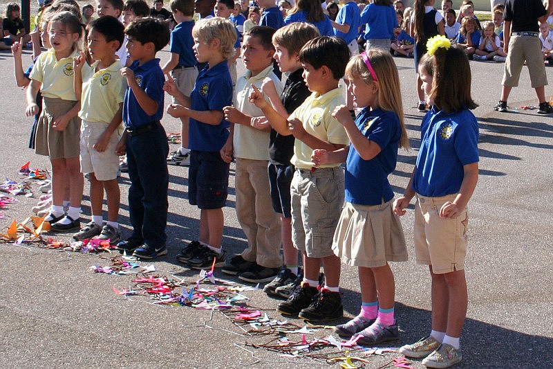 Children made 738 origami cranes.