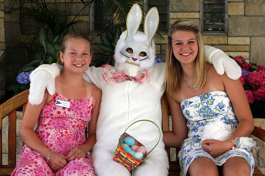 Michelle and Savannah Gallatin pose with the Easter Bunny Sunday, April 24 at Bird Key Yacht Club.