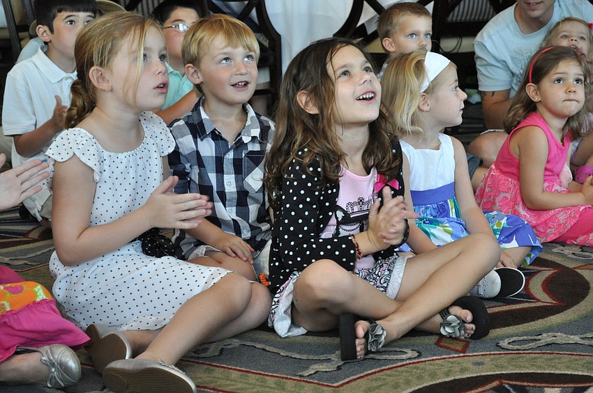 Cecelia Mould, Jake Hoddinott, Carly Birnbach, Danika Hoddinott and Isabella Volkert are in awe off Spaghetti the Clown's amazing tricks.