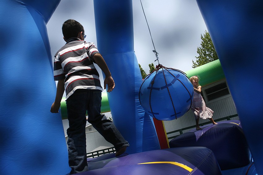 The FCAT Fun Day featured a variety of inflatable bounce houses and obstacle courses.