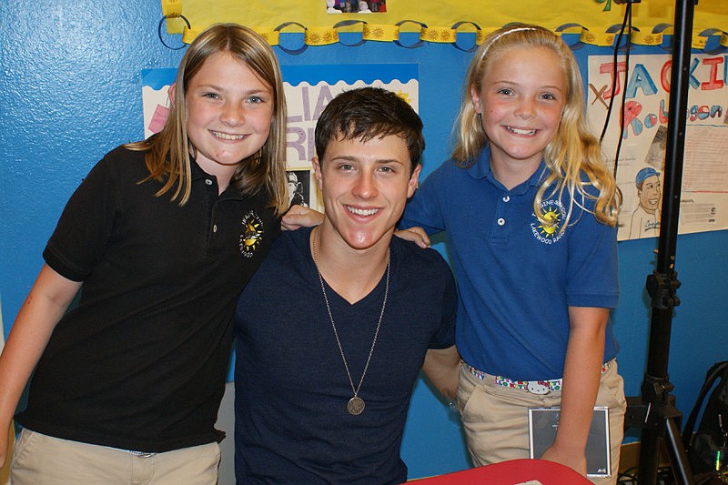 McKenzie Mortiz, left, and her friend Cassie Wilson, right, got an autograph from Disney star Shane Harper. Photo submitted by Keri Moritz.