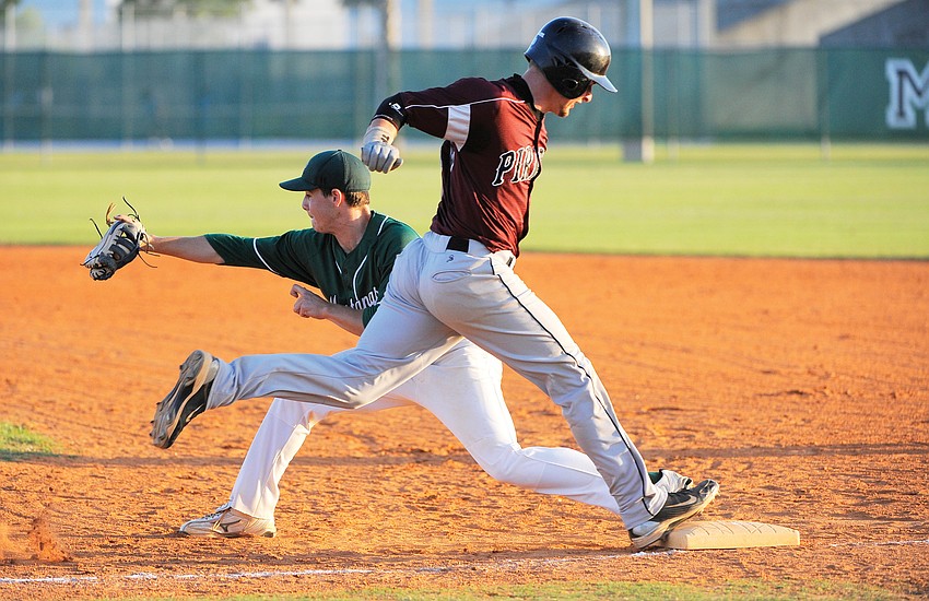 Braden River's Garrett Russini attempts to outrun the throw to first base.