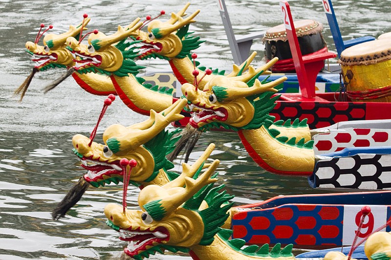 The sport of dragon boat racing is a paddlesport that uses a canoe-shaped boat painted and adorned with a Chinese dragon head, tail, drum and scales.