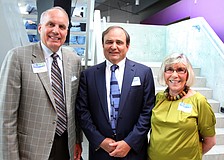 Ron Vaughn, Fritz Faulhaber and Gerri Aaron pose together at the opening of the G. WIZ Faulhaber Fab Lab Thursday, May 5 at G. WIZ.