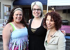 Midgeann Schotsch, Jennifer Sabin and Stephanie Broche, three of the six owners of Five Points Collective, pose together Friday, May 6 during the Wine, Cheese and Beads event at Five Points Collective.