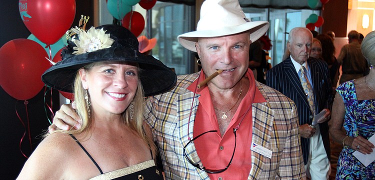 Alicia Collins and Jes Santaularia were proud to be originally from Louisville, KY on Saturday, May 7 at the Kentucky Derby party at the Sarasota Yacht Club.