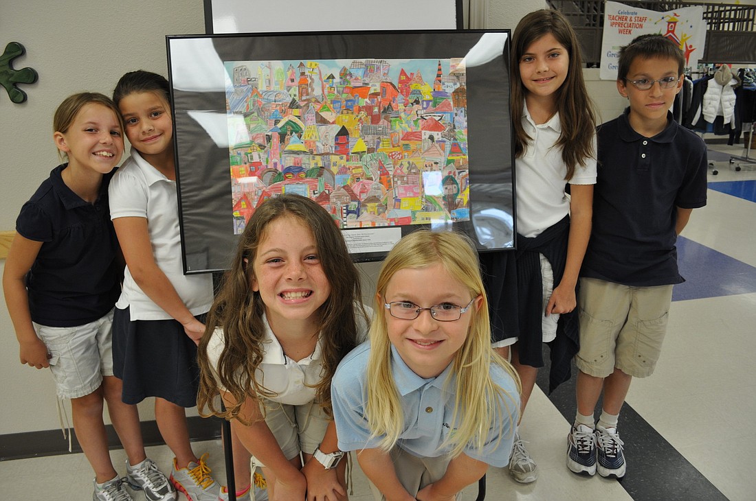 Third-grade students at Willis Elementary show off the collage they made. From left: Olivia Cornelias, Kara Smith, Hayden Spring, Cami Willis, Manoela Dossantos and Igor Kitanovski.