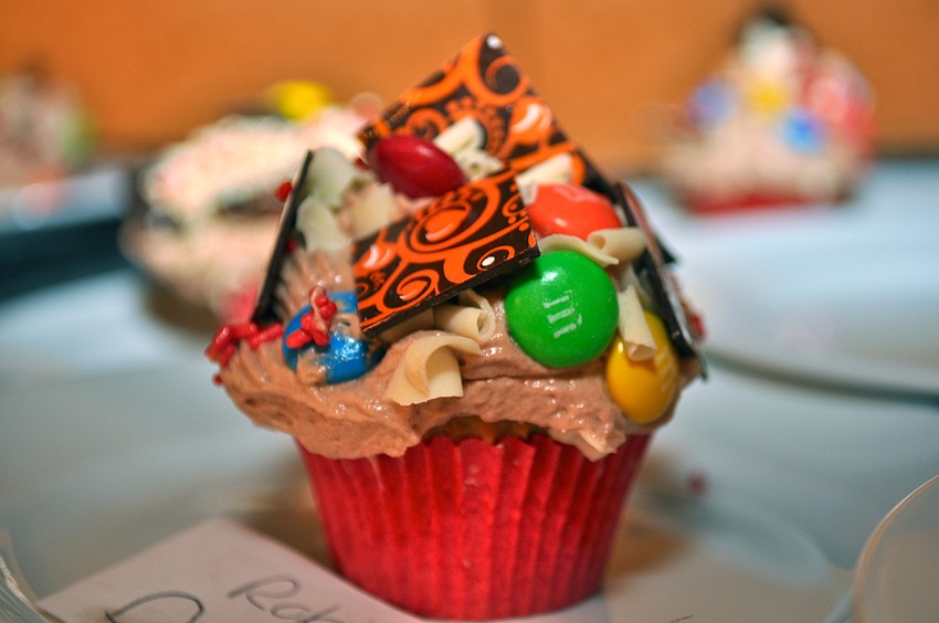 Mae Cavazos, the pastry chef at the Ritz-Carlton, Sarasota, helped Gocio Elementary students decorate cupcakes.