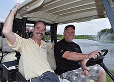 Jim Eschmann and Rick Griffin grabbed lunch before heading out on the course.