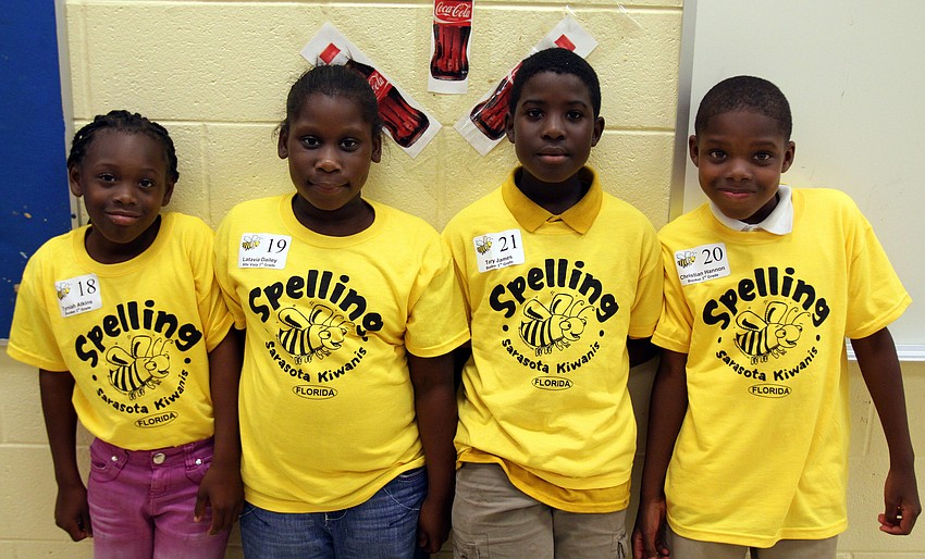 Tyniah Atkins, Latavia Dailey, Tory James and Christian Hannon from Booker Elementary wait for the start of the 3rd grade section of the Sarasota Kiwanis Club's Spelling Bee Friday, May 13 at the Boys and Girls Club.