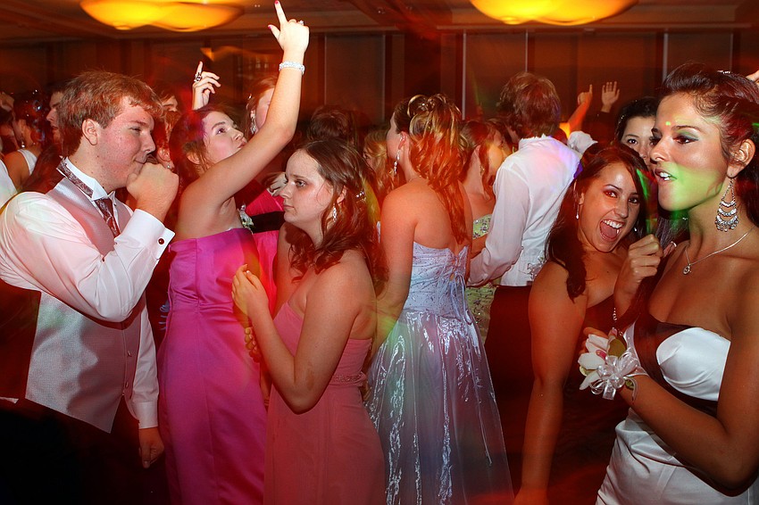 Sarasota High School students enjoy dancing around with their friends Saturday, May 14 at the Sarasota High School's prom at the Hyatt Regency.
